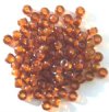 100 4x6mm Crow Beads Transparent Dark Topaz